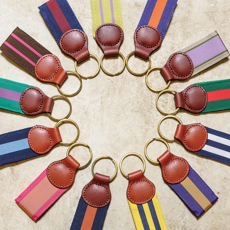 Key fobs accented with genuine leather.